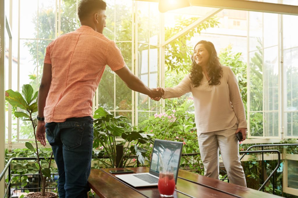 colleague-meeting-in-sunny-cafe