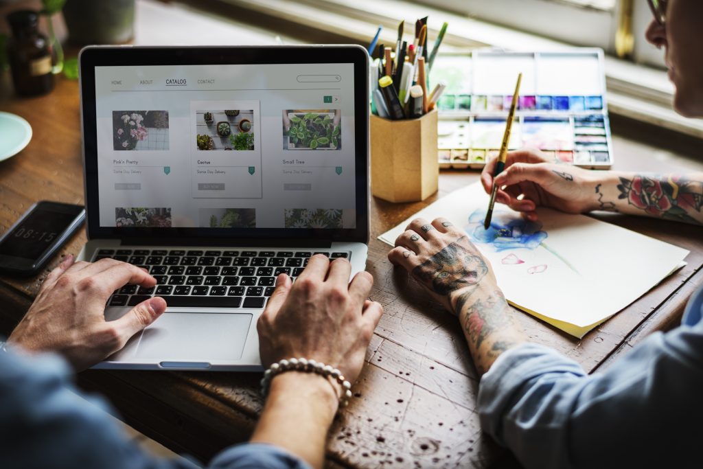 hands-searching-for-plants-buy-online-shop