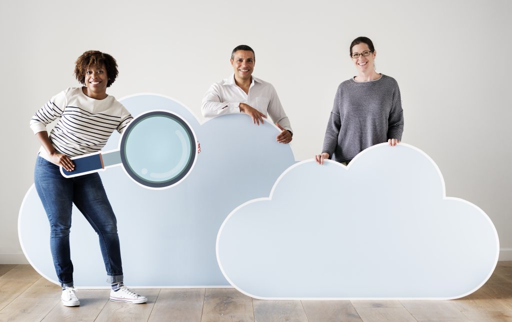 happy-people-with-cloud-and-technology-icons