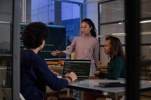 young-programmers-having-meeting-in-evening